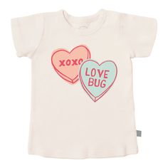 Get your little love bugs ready for Valentine's Day (and super-cute photo opps!). This adorable vintage-inspired tee is perfect for active kiddos, and it's great for layering, too. 100% organic cotton G.O.T.S. certified non-toxic, eco-friendly dyes ethically made in India Also Available in matching Baby Bodysuit Valentines Graphic Tee, Toddler Graphic Tee, Organic Clothes, Mom Graphic Tees, Candy Hearts, Matching Baby, Cat Graphic Tee, The Perfect Girl, Girls Graphic Tee