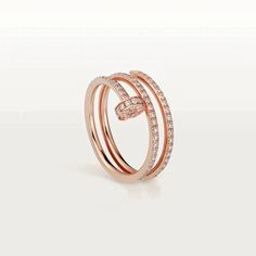 Elevate your look with the JUSTE RING, crafted in 1.8mm pink gold and adorned with a double row of sparkling diamonds. This luxurious piece exudes sophistication and elegance, making it the perfect addition to any outfit. Experience the beauty and prestige of this premium ring. ADDITIONAL INFORMATION Color: Pink Gold Stone : Diamonds REF.: CRB4210800 Material:- 925 Sterling Silver - 18k Gold Plated Width: 1.8 mm Ring US size: 5, 6, 7, 8 Our replica products are committed to quality and color whe Piaget Ring, Juste Un Clou Ring, Cartier Gold, Cartier Ring, Ring Ring, Gold Gold, Brilliant Cut Diamond, Yellow Gold Rings, Luxury Jewelry