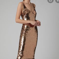 Saloni Evening Gown Gold & Metallic Sequin Embellishments Sleeveless With Scoop Neck Concealed Zip Closure At Back Designer Fit: Dresses By Saloni Typically Fit True To Size. Elegant Gold Sleeveless Sequin Dress, Gold Sleeveless Holiday Evening Dress, Evening Sleeveless Sequin Dress, Evening Sequin Sleeveless Dress, Gold Floor-length Midi Dress For Parties, Gold Sleeveless Evening Dress With Sequins, Gold Sleeveless Sequined Evening Dress, Gold Sleeveless Sequin Dress For Gala, Embellished Sleeveless Midi Dress For Evening