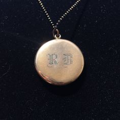 "This elegant Art Deco gold filled locket features a finely sculpted profile of a lovely lady surrounded by an oval ring of dark glittering paste stones and another ring of interesting engravings. The back of the locket has the initials \"RB\" engraved in Edwardian-style lettering. Inside, you can see the letters \"C, Q, and R\" in a small triangle which indicates the jewelry company who crafted this locket was the esteemed Carter, Qvarnstrom, & Remington of Attleboro, MA (they produced lock Antique Polished Jewelry For Weddings, Bronze Engraved Jewelry For Anniversary, Bronze Vintage Charm Jewelry For Anniversary, Victorian Polished Jewelry For Weddings, Victorian Jewelry For Wedding With Polished Finish, Victorian Style Polished Jewelry For Wedding, Bronze Jewelry With Vintage Charm For Anniversary, Bronze Locket Jewelry For Wedding, Bronze Locket Jewelry For Anniversary