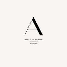 the logo for annna martini's interiores, which is designed in black and white