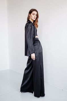 Planning a wedding during a cold weather month? Keep the bride and bridesmaids warm with our satin jacket ANDREA. Set ANDREA. You can order every item separately or with set. The Andrea satin set combines the trends of the 2021 season. - oversize jacket - palazzo pants https://www.etsy.com/listing/976154459/satin-pants-andrea-city-hall-wedding?ga_search_query=palazzo&ref=shop_items_search_2&pro=1&frs=1 - lace-up crop top https://www.etsy.com/listing/962177288/lace-up-corset-andrea-wi Sleek Evening Blazer Single Breasted, Sleek Evening Blazer With Hidden Button Closure, Single Breasted Satin Outerwear With Suit Collar, Single-breasted Satin Outerwear With Suit Collar, Sleek Notch Lapel Blazer For Party, Satin Outerwear With Lapel Collar For Work, Sleek Single-breasted Blazer For Night Out, Sleek Party Blazer With Suit Collar, Sleek Satin Blazer For Night Out