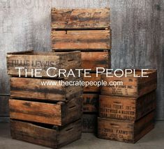 several wooden crates stacked on top of each other with the words the crate people above them