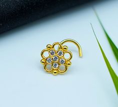 Product Detail : - Material : - 925 Sterling silver with 14krt Micron gold plating,nickle free Plating Color : -  Gold Width  :-  5 mm Wire Gauge size : - 22 Gauge / 0.62 mm                                    20 Gauge / 0.80 mm                                   18 Gauge / 1.00 mm                                    16 gauge / 1.2 mm Shipping Detail: Processing Time : - 1-2  Working Day Shipping Time : - 15-20 Working days Shipping Service : - USPS,DHL eCommerce,UPS and FedEx. Note :-  1) For Expr Gold Nickel-free Flower Ring As Gift, Gold Nickel-free Flower Ring For Gift, Nickel-free Gold Flower Ring For Gift, Gold Flower Ring Nickel Free For Gift, Dainty Gold Flower Ring With Prong Setting, Big Nose Piercing, Gold Nose Stud Indian, Nose Stud Indian, Faux Nose Ring