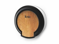 a wooden and black knob with the word kiss on it