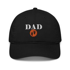 "Celebrate Father's Day in style with our exclusive cap! Featuring the prominent design of the word \"DAD\" on the print, this cap is the perfect gift to honor fathers on their special day. Crafted with high-quality materials and a comfortable fit, this cap blends fashion and tribute into one accessory. Make dad feel proud and stylish with our \"DAD\" cap! A classic dad hat never goes out of style--especially one that's made of 100% organic cotton. The high quality and 100% organic cotton of this hat makes it a sustainable choice. You'll be able to enjoy it for years to come. Complement your stylish outfits with this eco-friendly hat! * 100% organic cotton * Fabric weight: 8 oz/yd² (271 g/m²) * 3/1 twill * Unstructured * 6 panel * Matching sewn eyelets * Self-fabric adjustable closure with Trucker Dad Hat With Curved Bill For Baseball Season, Adjustable Dad Hat Baseball Cap For Father's Day, Letter Print Hat For Father's Day Gift, Father's Day Dad Hat With Letter Print, Black Dad Hat Cap As A Gift, Curved Bill Trucker Hat With Letter Print As Gift, Adjustable Flat Bill Dad Hat For Father's Day, Father's Day Hats With Letter Print, Black Dad Hat As Gift