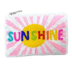 a small purse with the word sunshine in bright colors and beads on it's front