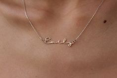 ♥ Mother's Day Gift, Personalized jewelry, Valentines Day Gift, 14k Solid Gold Name Necklace Item Detail: - Material: 14k Solid Gold -Hypoallergenic and Made for Sensitive Skin Colours: -14k solid yellow gold -14k solid white gold -14k solid rose gold ❤️PROCESSING TIME: 5-9 business days ❤️SHIPPING TIME: US is 2-9 days Worldwide is 5-15 days ❤️You can upgrade shipping to EXPRESS at check out if you want your package quicker ♥ UNIQUE AND PERFECT GIFT♥ -Birthday, holiday, a special occasion, or ju Silver Nameplate Necklace Stamped 14k, 14k Gold Name Necklaces For Weddings, Dainty Name Necklaces For Anniversary, Minimalist Name Necklaces For Wedding, Minimalist Necklaces With Names For Wedding, Dainty Anniversary Necklaces With Names, Silver 14k Stamped Name Necklace For Mother's Day, Delicate Sterling Silver Name Necklace For Anniversary, Sterling Silver Nameplate Necklace For Wedding