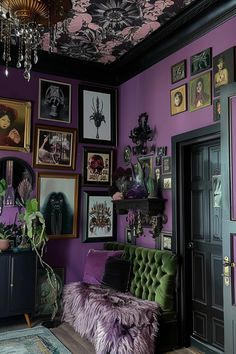 a living room with purple walls and pictures on the wall above the couch is filled with plants