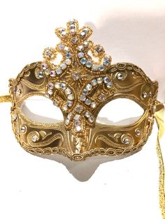 Carnival Evening Masquerade Eye Mask, Gold Masks For Mardi Gras Evening Events, Gold Mask For Mardi Gras Evening, Gold Masks For Mardi Gras Evening, Gold Venetian Masquerade Mask For Halloween, Venetian Gold Masquerade Mask For Halloween, Gold Eye Mask For Costume Party, Elegant Formal Mask For Carnival, Elegant Formal Masks For Carnival