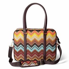 NWT Missoni for Target Travel Tote Bag Zig Zag Chevron 12"x16" Missoni for Target Iconic Chevron Travel Tote Laptop Bag NWT is brand new with tags, and is part of the new anniversary collection - not the old Missoni for Target collaboration. Bag measures approximately 16.5” x 5” x 12.5” and is made of durable polyester 1200D 2/2 Twill with PEVA backing. Spot clean. Bag has a large zip opening, inside zip pocket and interior cell phone pocket. Double handles and an adjustable crossbody strap for Work Laptop Bag, Work Bags Laptop, Work Laptop, Zig Zag Print, Travel Tote Bag, Travel Tote, 20th Anniversary, Women's Bags, Missoni