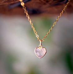 "Rose Quartz Heart Necklace - 14k Gold Filled or Sterling Silver Looking for a unique accessory for some self love, or love for that special someone? Crafted from 14k gold filled or sterling silver and natural Rose Quartz, this pendant is the perfect, sparkling way to show anyone how much you care. Rose Quartz is a stone of love. It is believed to restore trust & harmony in relationships and encourage unconditional love. It purifies the heart and promotes self love, inner healing, and friendship Delicate Heart Cut Jewelry Gift, Feminine Heart-shaped Jewelry Gift, Feminine Heart-shaped Jewelry For Gifts, Delicate Heart Cut Jewelry For Gift, Pink Gold Heart Charm Necklace As Gift, Pink Gold Heart Charm Necklace For Gift, Delicate Valentine's Day Jewelry, Feminine Heart Necklace As A Valentine's Day Gift, Feminine Heart Necklace For Valentine's Day Gift