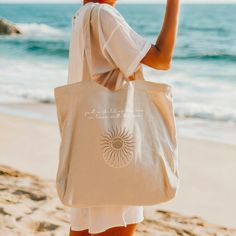 Get rid of all the plastic and pack your goodies in this spacious organic cotton tote bag. Fill it up with groceries, books, and travel essentials--there's room for everything! * 100% certified organic cotton 3/1 twill * Fabric weight: 8 oz/yd² (272 g/m²) * Dimensions: 20″ × 14″ × 5″ (50.8 × 35.6 × 12.7 cm) * Capacity: 6 gallons (23 l) * Weight limit: 30 lbs (13.6 kg) * 1″ × 25″ (2.5 × 63.5 cm) long self-fabric dual straps * Open main compartment, flat bottom * Blank product sourced from China o Eco-friendly Beige Cotton Beach Bag, Eco-friendly Cotton Beach Bag For Everyday, Eco-friendly Recyclable Canvas Tote Bag, Organic Recyclable Canvas Tote Bag, Organic Style Recyclable Canvas Tote Bag, Eco-friendly Cream Canvas Bag, Organic Reusable Canvas Bag For Everyday Use, Organic Recyclable Canvas Bag For Daily Use, Organic Everyday Reusable Canvas Bag