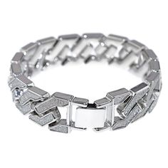 Dazzling men's Cuban hip hop bracelet. Silver tone over nickel-free alloy metal. Stunning squared chain links design. Bracelet length is 8.5" inches long. Thick bracelet measures 18 mm wide. Chunky bracelet weighs 75 grams. Individually adhered sand blast links. Sand blast looks like crushed stones. Bracelet bling links shine very bright. Features a stylish fold-over box clasp. This piece looks like a million bucks. Matching sand blast chain is available. 100% FREE SHIPPING in the USA. Customer Jewelry Set Design, Chunky Bracelet, Design Bracelet, Crushed Stone, Chunky Bracelets, Box Clasp, Chain Links, Bracelet Silver, Silver Bracelets