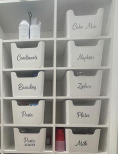 the shelves are filled with plastic containers and other things to use in this closet for storage