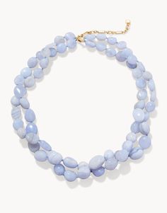 Inspired by the tranquil tidal saltwater of the May River, The Bluff Necklace is layered in Blue Chalcedony beads on soft blue rope. Please note: This design features natural stones and each piece is one-of-a-kind. Colors and patterns may vary slightly from the image shown.