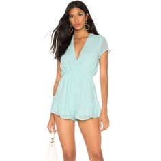 Superdown Nwt Joanie Surplice Ruffle Romper In Mint Size Medium. Chiffon Fabric. Surplice Front. Elasticized Waist. Cap Sleeves. Ruffled Hem. New With Tag Attached. 100% Polyester Pit To Pit: 19" Waist: 14" Relaxed/20" Stretched Inseam: 2" Casual Ruffled V-neck Jumpsuits And Rompers, Spring Date Night Jumpsuits And Rompers With Ruffle Hem, Spring Date Night Jumpsuit With Ruffle Hem, Chic Spring Jumpsuits And Rompers With Ruffle Hem, Fitted Jumpsuits And Rompers With Ruffle Hem For Brunch, Chic Spring Jumpsuit With Ruffle Hem, Chic V-neck Jumpsuits And Rompers For Daywear, V-neck Ruffled Jumpsuits And Rompers For Spring, Casual Ruffled Jumpsuits And Rompers For Date Night