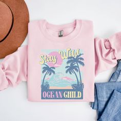 Vintage Summer Sweatshirt, Beach Sweatshirt, Aesthetic Trendy Shirts for Women, Retro Beach Crewneck Sweatshirt This is going to be your perfect go-to sweatshirt this summer!  The pastel vintage vibe of this sweatshirt gives it a lived-in look that's perfect for summer days spent at the beach. The design of this sweatshirt incorporates nostalgic elements, such as faded graphics and a distressed look, giving it a timeless, vintage feel, evoking a sense of summer fun and relaxation.   *SIZE AND FIT* -This crewneck sweatshirt design will be printed on a high-quality, Gildan 18000 unisex sweatshirt which is super soft and has a comfortable feel that's perfect for lounging by the shore.    -Sizes run true to size. However, if you like your sweatshirts loose or oversized, you might want to order Vsco Style Graphic Print Relaxed Fit Sweatshirt, Pink Cotton Sweatshirt For The Beach, Casual Pink Beach Sweatshirt, Vsco Style Graphic Print Relaxed Sweatshirt, Relaxed Fit Graphic Print Sweatshirt Vsco Style, Casual Pink Sweatshirt For Vacation, Pink Letter Print Sweatshirt For Vacation, Vsco Style Graphic Print Crew Neck Sweatshirt, Trendy Shirts For Women