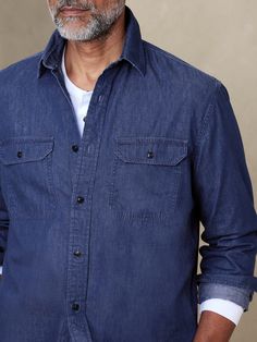 At once rugged and luxurious, this beautiful chambray shirt is made from beautifully smooth and soft cotton that is specially washed for an already-loved feel.  UNTUCKED: Specially cut 1" shorter through the body for an untucked fit that still looks sharp.  Spread collar.  Chest pocket.  Button front.  Shirttail hem.  Standard fit.  Long sleeves.  Untucked length: Hits at the high hip.  Body length (size M): Regular 29", Tall 30" Sleeve length: Regular 35", Tall 36. 5" Model: Size M, 6'2" (188cm Washed Blue Button-up Shirt For Casual Gatherings, Classic Long Sleeve Pre-washed Shirt, Pre-washed Cotton Button-up Shirt, Unstructured Washed Shirt In Medium Wash, Dark Wash Cotton Top For Fall, Medium Wash Chambray Shirt, Relaxed Fit Chambray Shirt With Button Closure, Rugged Relaxed Fit Button-up Shirt, Relaxed Fit Washed Shirt For Everyday