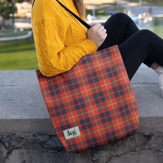 Stylish chic plaid shoulder bag in bright holiday colors. Design includes a tweed pattern of overlapping layers intertwining the individual base colors and a light graphic texture to create a softer, flannel like, look. Corner tag, simple understated embellishment, printed with personalizable monogram and name. Front and back designs match. Beautifully attractive, stand-out accessory suitable for everyday use. Casual Red Bags For Winter, Casual Red Winter Bags, Casual Red Bags, Casual Plaid Bags For Fall, Plaid Rectangular Bag For Fall, Plaid Bags For Everyday Use In Fall, Fall Plaid Rectangular Shoulder Bag, Fall Plaid Rectangular Bag, Everyday Plaid Bags For Fall