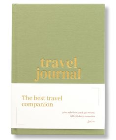 a green travel journal with the words travel journal on it's front and back cover