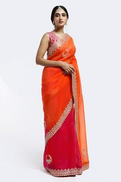 Bright pink and orange ombre saree with border embroidery and scattered butti work using gota patti and thread work. Paired with a pink blouse with floral embroidery. - Aza Fashions Fusion Style Pre-draped Saree With Zari Work For Diwali, Multicolor Pre-draped Saree With Gota Work, Fusion Style Pre-draped Saree With Zari Work For Navratri, Orange Saree With Dori Work, Orange Designer Saree With Dori Work, Designer Orange Saree With Dori Work, Orange Zari Work Pre-draped Saree, Traditional Orange Saree With Dori Work, Festive Orange Pre-draped Saree With Resham Embroidery