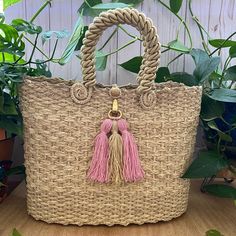 Description: Elegant Large Summer Handwoven Bag Condition: Brand New! Details: Handmade Item Material: Iraca Palm Fiber Dimensions: Bag: 10"L X 12w X 5" W ( See Pictures For Measures For Details) Handle: 5" Total Length: 17" Material: Iraca Palm (Natural Fiber) Style: Hippie/ Bohemian/ Summer The Iraca Palm Handwoven Process Is Exceptionally Detailed Handwork Passed Down Through Generations On Colombia’s Northern Caribbean Coast. This Bag Was Produced By An Artisan Collective In The City Of Usia Bohemian Braided Rectangular Bag, Natural Fiber Summer Bags, Bohemian Braided Beige Bag, Bohemian Woven Leather Beach Bag, Summer Pink Woven Leather Bags, Pink Woven Leather Bags For Summer, Bohemian Braided Bucket Bags, Bohemian Beige Beach Bag With Woven Leather, Bohemian Woven Leather Tote Beach Bag