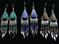 Unique design Bohemian earrings, metalwork alpacca silver wire frame, dangling beads and stone beads. Bohemian Teardrop Jewelry With Dangling Beads, Bohemian Chandelier Earrings With Ear Wire For Festivals, Handmade Bohemian Long Drop Earrings, Wire Wrapped Chandelier Earrings For Festivals, Multicolor Teardrop Bohemian Jewelry, Bohemian Multicolor Teardrop Jewelry, Bohemian Teardrop Jewelry With Ear Wire, Bohemian Teardrop Beaded Earrings For Pierced Ears, Bohemian Pierced Chandelier Earrings For Festivals