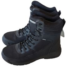 a pair of black boots with laces on the side and one shoe in the middle