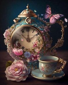 a tea cup and saucer sitting next to an ornate clock with butterflies on it