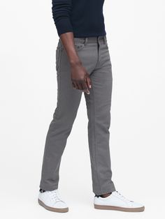 The same supreme comfort and ease of movement as our Traveler Jeans - now a jean-style chino made with high-recovery Italian stretch cotton.  Zip fly closure.  Traditional five-pocket styling.  Produced in a facility that runs P. A. C. E.  – Gap Inc. 's program to educate and empower women in the communities where our products are made.  Learn more HERE Mid-rise.  Skinny through the thigh, knee and leg.  Skinny leg opening.  Model: Size 32x32, 6'2" (188cm).  Stretch Travel Pants, Empower Women, Travel Information, Jeans Style, Grey Jean, Stretch Cotton, Women Empowerment, Style Guides, Trunk