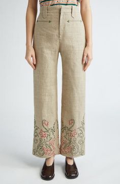 A Victorian-era travel bag provided the trumpetflower embroidery pattern growing from the hems on these pants cut from richly textured, breathable linen. 29" inseam; 20 1/2" leg opening; 12" front rise; 15 1/2" back rise (size 27) Zip fly with hook-and-bar closure Front welt pockets Lined 100% linen Dry clean Imported Designer Clothing Embroidered Linen Wide-leg Bottoms, Led Fashion, Fabric Gift Bags, Fragrance Design, Fabric Gifts, Free Fabric, Embroidery Pattern, Beauty Trends, Linen Pants