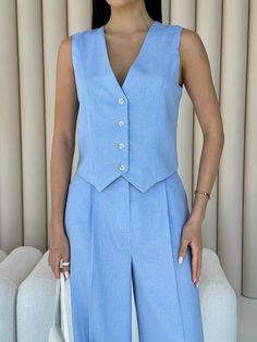 "Stylish blue pantsuit is the perfect choice for an elegant summer look!  Crafted from pure linen, the set features a cropped button-down vest and palazzo pants with convenient pockets.  The suit is perfect for hot days, casual wear for every day, office and college, business meetings and formal wear, also for special occasions, wedding guests, graduation, family celebrations and more.   DETAILS  - blue  - 100% linen  - 2 piece set  - crop vest  - buttoned  - high rise  - palazzo pants pockets Suit For Women Formal Wedding, Light Blue Vest Outfits For Women, Two Piece Blue Outfit, Elegant Linen Pantsuit For Formal Occasions, Elegant Linen Pantsuit For Formal Events, Summer Formal V-neck Sets, Elegant Sleeveless Blue Suits, Tailored Linen Pantsuit For Formal Occasions, Classic Linen Pantsuit For Formal Occasions