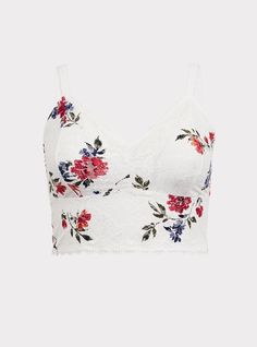 Soft and stretchy floral printed lace wraps a dreamy bralette that has flirty scalloped trim and is begging to peek out from tees and tanks. Matching style(s): Search 11665236. Wireless non-padded cups. Adjustable straps. Racerback. Scalloped lace trim. Semi-sheer . CONTENT + CARE: Nylon/spandex. Wash cold; dry flat. Imported plus size bra. SIZE + FIT: Model is wearing size 2 with Torrid Strapless Bra. The best plus size women's unlined lace crop bralette bras in patriot floral made of lace. V-neck Lace Crop Top With Lace Trim, Lace Cami Crop Top With Lace Trim, Spring Cami Bra With Lace Trim, Spring Delicate Lace Cami Crop Top, Bra Friendly Cropped Lace Tops, Lace V-neck Crop Top With Lace Trim, Bra Friendly Lace Cropped Tops, Summer Lace Bra With Lace Trim, Spring Lace Cami Bra