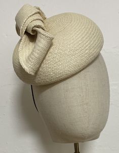 When you buy a Fascinator made from Toquilla Straw, you don't just buy a Fascinator, you buy a piece of art. This genuine Panama hat is woven in Ecuador by Ecuadorian Artisans. Colour & Dimensions: ---------------------- Classic Button shape Color Natural Diameter: 27 cm Design: Carole  Shape: Blocked using the Large wooden block high quality straw Elastic band inside  It is made from 100% toquilla straw, the same fiber used to make the very famous Panama Hat.   Be aware this hat is made from na Summer Structured Crown Toquilla Straw Hat, Structured Crown Toquilla Straw Hat For Summer, Structured Crown Straw Hat For Summer, Summer Straw Hat With Structured Crown And Woven Detail, Summer Straw Hat With Structured Crown, Handmade Adjustable Formal Hats, Adjustable Structured Crown Straw Hat For Kentucky Derby, Adjustable Straw Hat With Structured Crown For Kentucky Derby, Straw Hat With Structured Crown For Spring