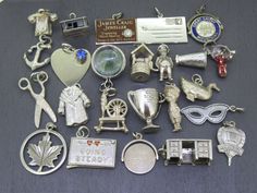 Choice of vintage sterling silver (previously worn) charm for charm bracelets. A variety of sizes and conditions so please view photos and ask any questions if needed though they all have age related wear and patina, pictures tell the best story. They are all either marked or tested and guaranteed sterling silver if unmarked. Great variety here! Options Are: Phone Cabin James Craig Jeweller  Envelope w/ SWAK on back  Great Smoky Mountains Enamel Spinner Anchor Heart with Blue Rhinestone Four Leaf Clover in Lucite Well Fancy Man Opening Martini Shaker with Devil Inside (some wear to the enamel as can be seen) Scissors Mink Coat Wool Spinner Worlds Greater Dancer Trophy  Andy Capp Cartoon Puffy Goose (some splitting but it looks manufacturer that way, don't see it falling apart soon) Eye Mas Anchor Heart, Andy Capp, Martini Shaker, Vintage Sterling Silver Charms, Mink Coat, Four Leaf, 2000s Fashion, Blue Rhinestones, Leaf Clover