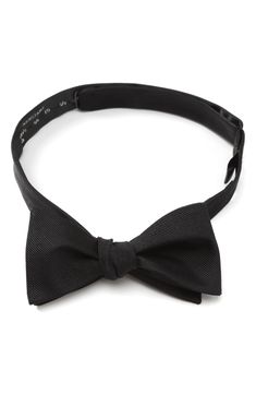 Look extra charming at your next formal event in this dapper self-tie bow tie cut from pure silk. 2" x 40" Self-tie; adjustable 100% silk Dry clean Imported Pre-tied Satin Bow For Black Tie Events, Classic Adjustable Bow For Business, Adjustable Classic Bow For Business, Classic Bow Tie For Black-tie Events, Classic Adjustable Bow Tie For Black-tie Events, Classic Adjustable Bow Ties, Classic Pre-tied Satin Bow Tie, Classic Pre-tied Bow Tie, Classic Pre-tied Bow With Ties