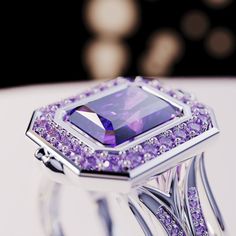 Introducing The Violet Crown: This bold statement ring is perfect for any occassion. As a gift for her, a wedding ring or a gift for yourself - because you deserve it - it is guaranteed to impress. A bold and beautiful simulated amethyst sits like a crown in the center of a gemstone halo. The sides covered with beautiful simulated diamonds and purple enamel. Underneath you have premium quality silver with 4 layers of platinum for lasting durability and shine. With it's bold yet classical design Crown Emerald, Violet Crown, Blood Diamond, Classical Design, You Deserve It, Luxury Gift Box, Bold And Beautiful, Silver Pieces, Amethyst Gemstone