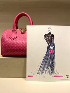 a card with a drawing of a woman's dress and handbag on it