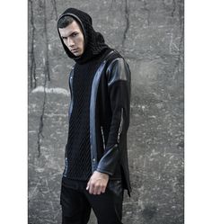 Introducing our avant-garde Black Raven Hoodie, a masterpiece of unique fashion. Crafted from super soft cotton, this hoodie blends two different fabrics, exuding street high fashion. Embrace the allure of the dark side with silver studs and faux leather stripes, making a bold statement. The hood features faux leather lining, adding an edgy touch to your style. With a longer back side and functional zippers on the elbow, you can achieve a chic and trendy look effortlessly. Two pockets with zippe Black Alternative Hooded Jacket For Streetwear, Black Futuristic Hooded Jacket With Long Sleeves, Futuristic Black Long Sleeve Hooded Jacket, Black Futuristic Long Sleeve Hooded Jacket, Futuristic Black Hooded Jacket With Long Sleeves, Cyberpunk Black Hooded Jacket With Detachable Hood, Cyberpunk Long Sleeve Hooded Jacket For Fall, Black Cyberpunk Jacket With Detachable Hood, Cyberpunk Hooded Jacket For Streetwear In Fall