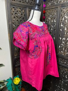 "Gorgeous Hand Embroidered \"Santo Nino\" Blouse - Elegant Mexican Embroidered Blouse The embroidery in this blouse is extremely beautiful and detailed! It is all hand embroidered by our Artisan Partners. Care * cloth wipe to clean Only * delicate care! * wipe to dry Please email me your questions before buying. All of my items come from a smoke and pet free environment. I WILL BE PROCESS YOUR ORDER IN 1-2 DAYS. If you need the item expressed shipped please contact me to request it and the listi Traditional Short Sleeve Blouse With Tonal Embroidery, Traditional Embroidered Blouse For Cinco De Mayo, Traditional Short Sleeve Blouse For Cinco De Mayo, Traditional Short Sleeve Embroidered Top With Tonal Embroidery, Traditional Tops With Tonal Embroidery For Festive Occasions, Traditional Embroidered Blouse For Fiesta, Traditional Blouse For Cinco De Mayo Fiesta, Traditional Embroidered Fiesta Blouse, Traditional Blouse With Embroidered Border For Fiesta