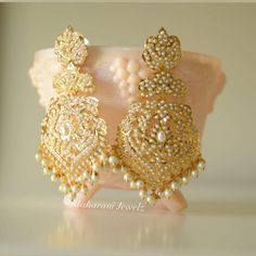 Ready to be shipped (Navratan option only) Pearl option will take a minimum of 3 weeks Beautiful 21k gold plated jadao earrings make a lovely statement for any bridal outfit or special occasion. Style: push-in Length: 3.5 inches Festive Temple Jewelry Pearl Earrings With Stone Work, Wedding Kundan Jhumkas Drop Earrings, Diwali Temple Jewelry Pearl Earrings With Stone Work, Bollywood Bridal Earrings With Stone Work For Reception, Temple Jewelry Pearl Earrings With Stone Work, Temple Jewelry Stone Work Danglers For Wedding, Temple Jewelry Style Danglers With Stone Work For Reception, Temple Jewelry Style Bridal Earrings With Stone Work, Temple Style Bridal Earrings With Stone Work