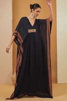 Black floor length kaftan with printed border and embroidered panel. Paired with a pant and separate inner. - Aza Fashions Black Kaftan For Festive Occasions And Festivals, Black Festive Kaftan For Festivals, Traditional Floor-length Kaftan With Embroidered Border, Bohemian Kaftan With Embroidered Border And Traditional Drape, Festive Maxi Kaftan With Embroidered Border, Bollywood Style Black Kaftan With Dabka, Designer Kaftan With Embroidered Border For Festivals, Black Kaftan For Festivals, Black Designer Kaftan