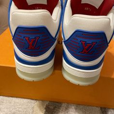 Louis Vuitton Trainer Sneaker White Red Blue 7 Comes With Box, Lv Bag, Dust Bags, And Come With A Second Pair Of Laces. Worn Once No Visible Flaws. - Brand: Authentic Louis Vuitton - Size: Men's 7 - Color: Red, White, And Blue - Calf Leather - 7 Hours Of Stitching For One Pair - Rubber Outsole - Lv Initials On The Tongue And Side - Monogram Flowers On The Outsole - Made In Italy Louis Vuitton Trainer, Louis Vuitton Trainers, 7 Hours, Louis Vuitton Shoes, Trainer Sneakers, Lv Bag, Red White And Blue, Sneakers White, Authentic Louis Vuitton