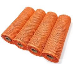 four rolls of orange mesh on white background