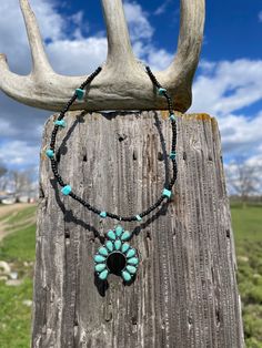 14inch handmade beaded necklace. With faux turquoise charm. Bohemian Black Beaded Dangle Necklaces, Turquoise Jewelry With Black Beads For Festival, Bohemian Beaded Turquoise Dangle Necklace, Turquoise Jewelry With Black Beads For Gift, Southwestern Beaded Turquoise Pendant Necklace, Southwestern Style Beaded Turquoise Pendant Necklace, Southwestern Turquoise Pendant Beaded Necklace, Turquoise Beaded Necklaces With Black Beads For Festival, Southwestern Style Beaded Turquoise Necklace Gift