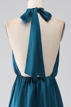 the back of a dress with a bow tie