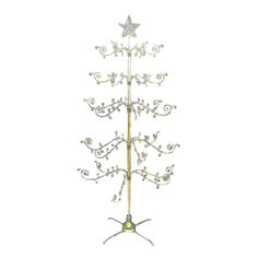 a metal christmas tree with stars on it