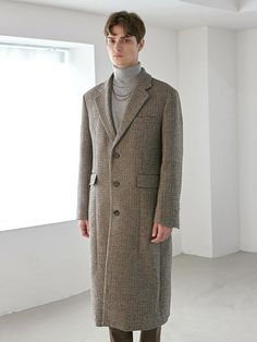 - Oversized single coat- Hound check pattern- Warm and thic, premium wool fabric- Back vent- Chest pocket and side flap pocketsMeasurements(In.)- M:       Shoulder     18.6in.,        Chest     23.3in.,        Sleeve     24.9in.,        Length     45.3in.              - L:        Shoulder     19.3in.,        Chest     24.1in.,        Length     25.2in.,        Sleeve     45.7in.  *Model size- 184cm, 64kg- Wearing size LComposition & Care- 90% Acrylic, 10% Wool- Dry cleaning onlyDesigner Houndstooth Pattern Long Coat For Business, Brown Houndstooth Outerwear For Winter, Business Long Coat With Houndstooth Pattern, Brown Wool Coat With Pockets For Business, Brown Houndstooth Winter Outerwear, Business Houndstooth Pattern Long Coat, Tailored Plaid Outerwear With Pockets, Plaid Single Breasted Long Wool Coat, Plaid Single-breasted Long Wool Coat