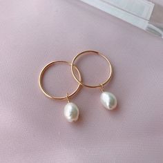 Gold Filled Pearl Hoop Earrings ❤️   These lovely two way wear baroque pearl earrings is definitely your every day wearing choice. Pearls can be removed from the hoop to make it more simple!  ♥ Material: Hoop- Made from high quality 14K gold filled which is tarnish-resistant, waterproof, safe for sensitive skin, and can guarantee long lasting wear. Pearl-Nature shiny freshwater pearls ♥ Size: Freshwater pearls are about 7mm-8mm               Hoops: 21mm ♥ Package: To avoid the over packaging and Everyday 14k Gold Pearl Drop Earrings, Everyday 14k Gold Hoop Earrings With Pearl Charm, Small Hoop Earrings With Pearl Charm In 14k Gold, Minimalist 14k Gold-filled Hoop Earrings With Pearl Charm, 14k Gold Filled Pearl Drop Earrings For Everyday, 14k Gold Filled Drop Pearl Earrings For Everyday, Minimalist Yellow Gold Hoop Earrings With Pearl Charm, 14k Gold-filled Drop Pearl Earrings For Everyday, Minimalist 14k Gold Filled Huggie Earrings With Pearl Charm